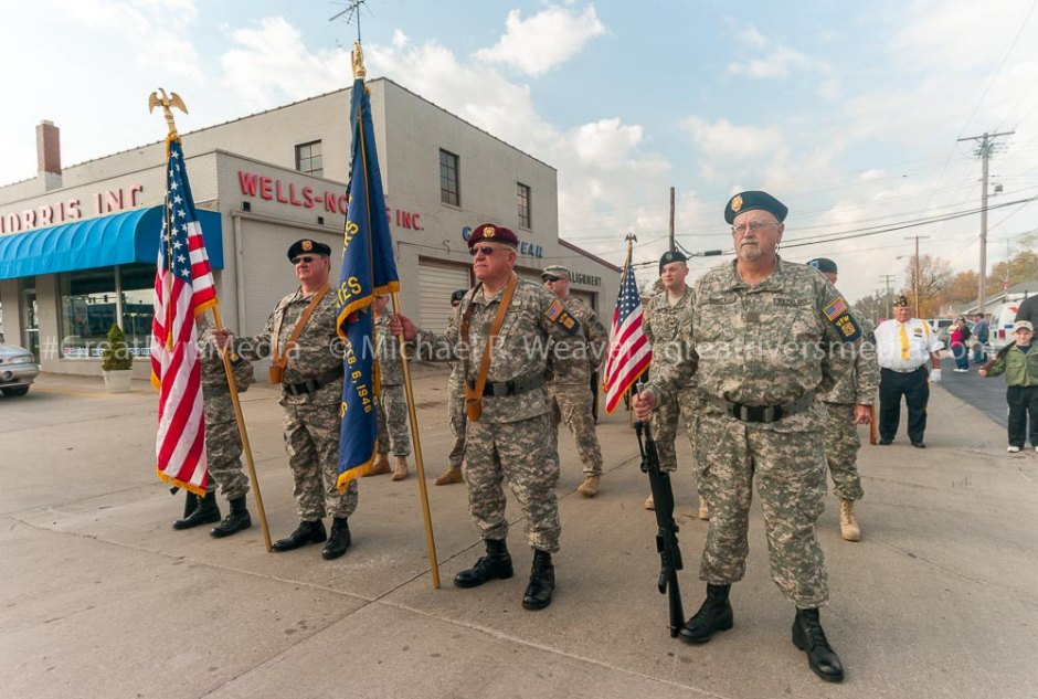 This image shows the 2010 Jerseyville Honor Guard and other marching units as they prepare to travel north on State Street in that year's Jerseyville Veteran Day Parade.